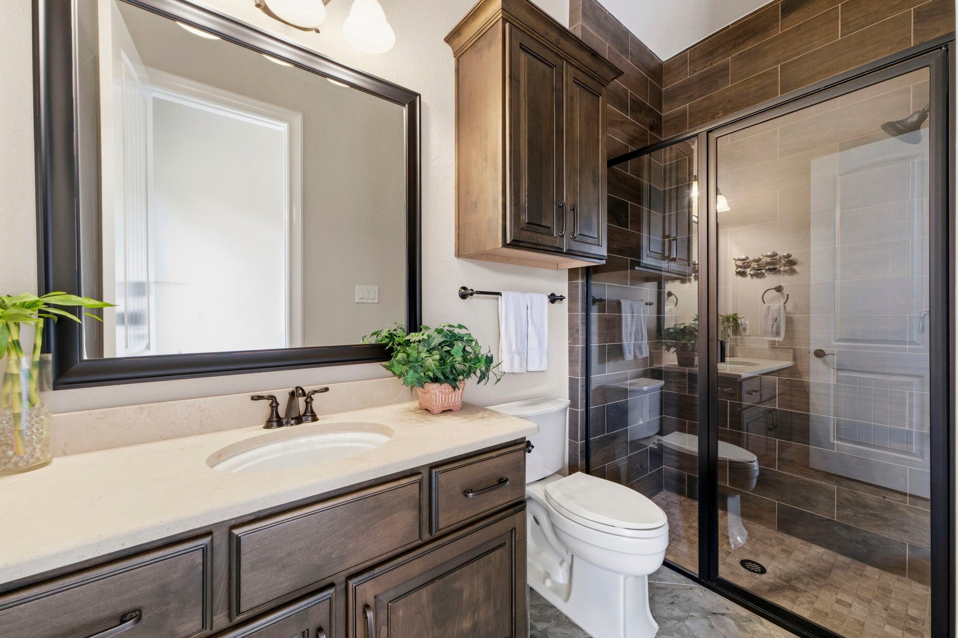 Full downstairs Bath was built beyond the Kitchen with a future pool Bath in mind