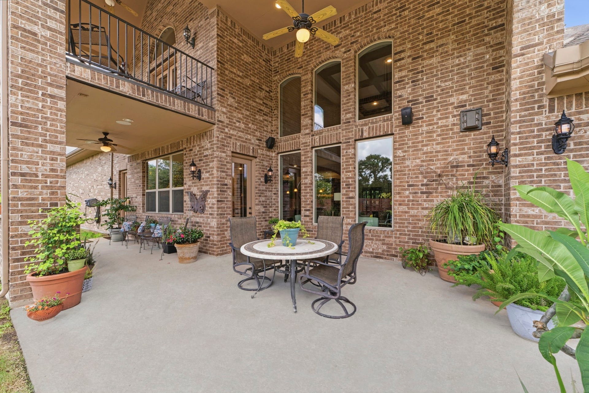 Enjoy an extended covered patio and outdoor Kitchen overlooking your private backyard!