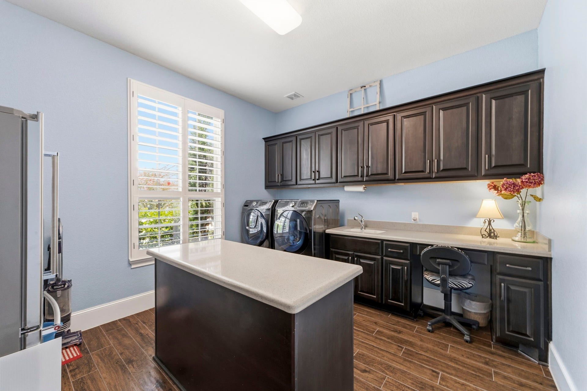 Spacious Laundry Room with Island & sink