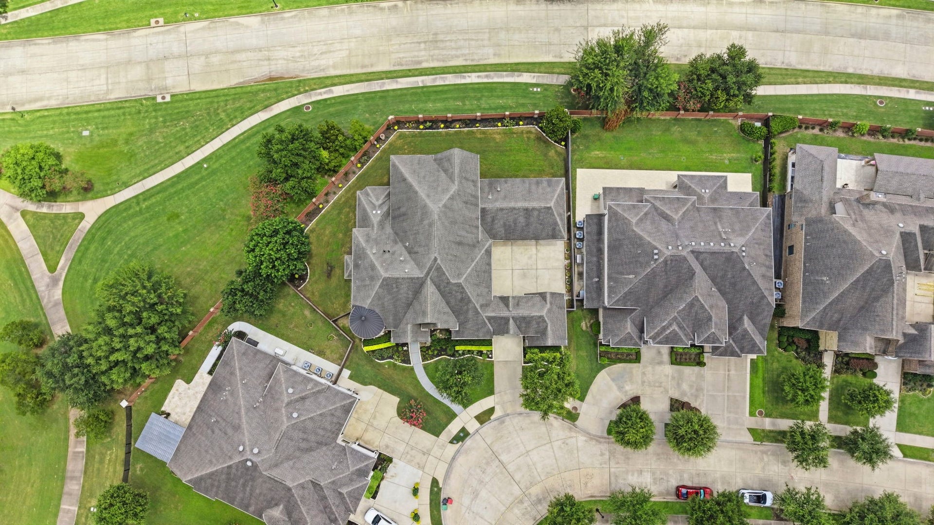 Plenty of room for a pool and no back neighbors! Gorgeous brick wall adds an extra luxurious touch to the backyard.