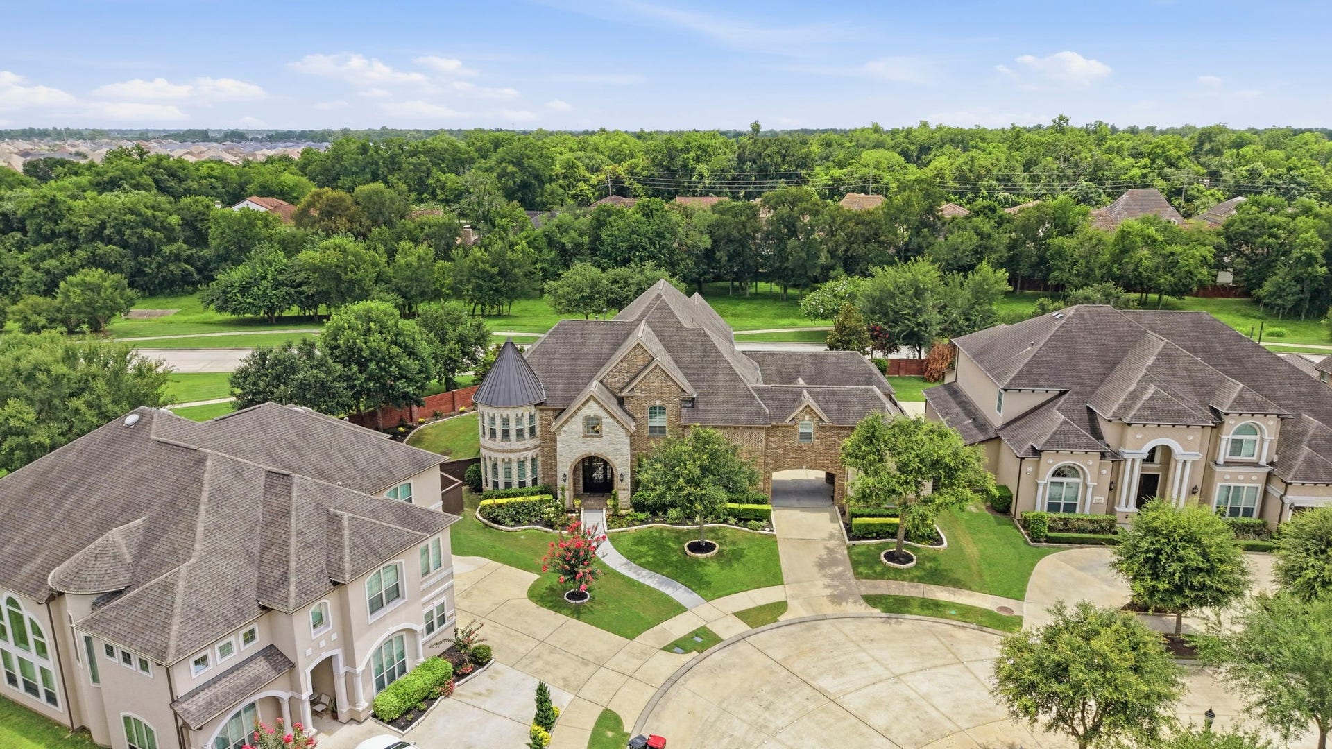 Aerial view of this beautiful castle-like home