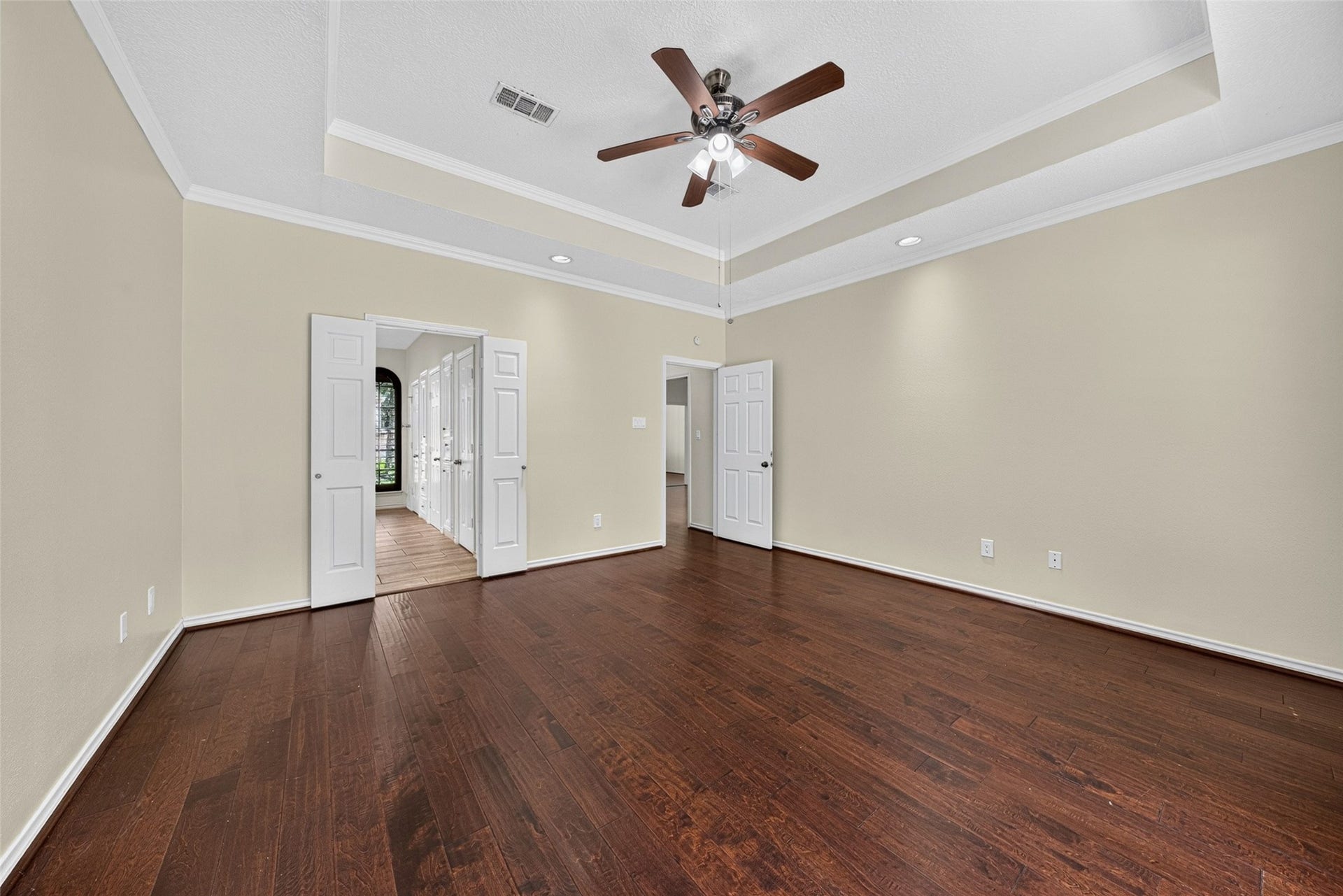 6206 Willow Pine Drive, Spring, TX 77379 Double doors lead to the primary bathroom enhancing the room's elegance and accessibility.