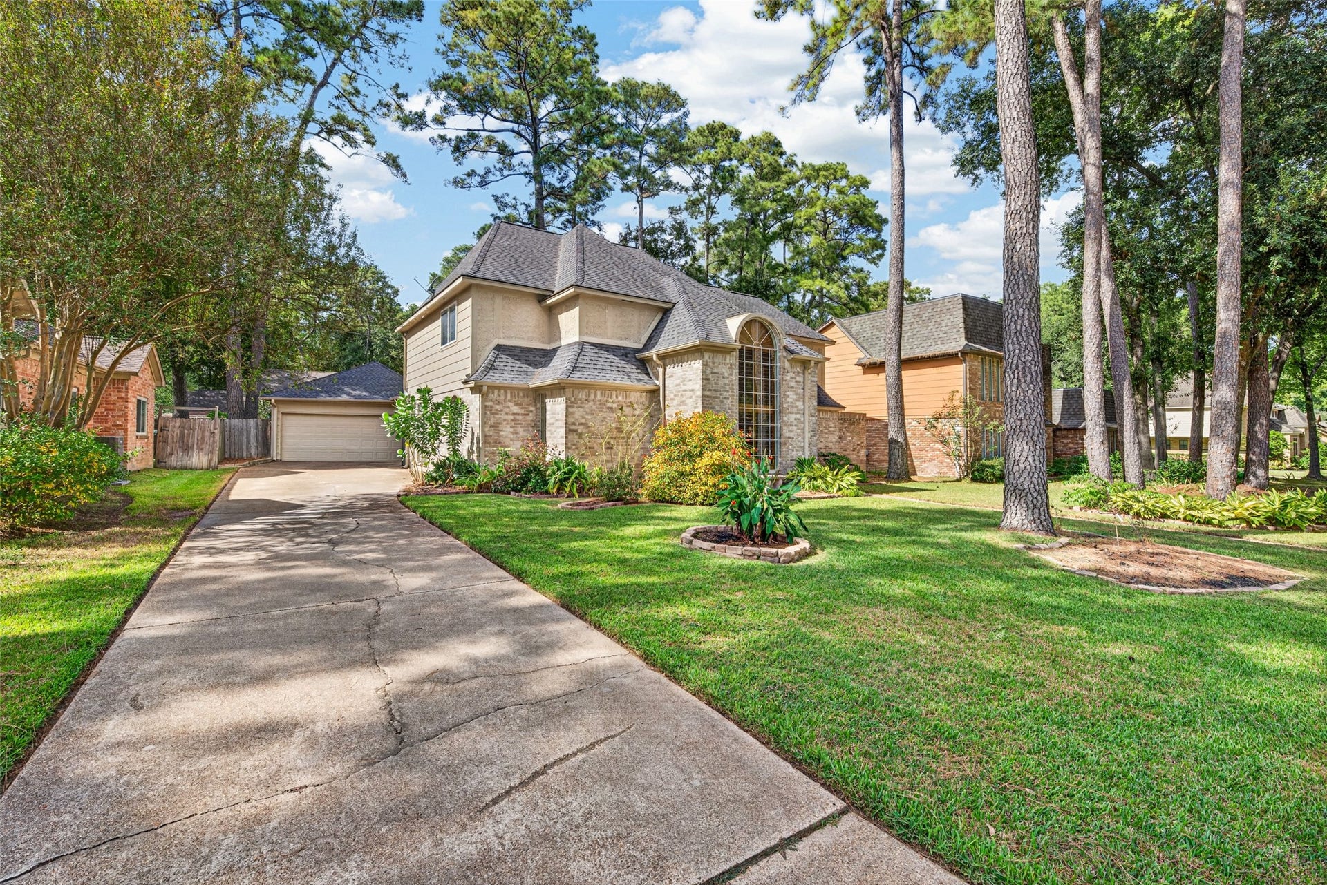 6206 Willow Pine Drive, Spring, TX 77379 Well maintained 2-story home is nestled among mature trees and lush landscaping and has a sprinkler system for low maintenance living.