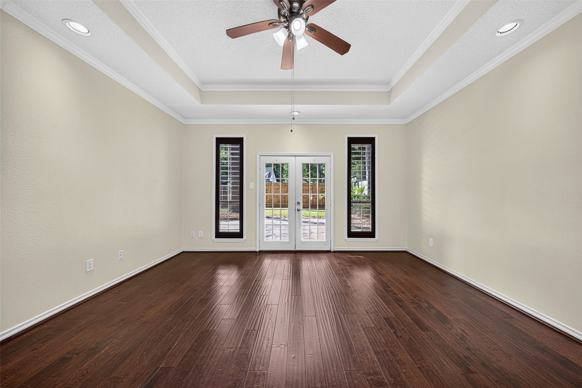 6206 Willow Pine Drive, Spring, TX 77379 The primary suite is located off the back of the home with french doors leading to the back patio.