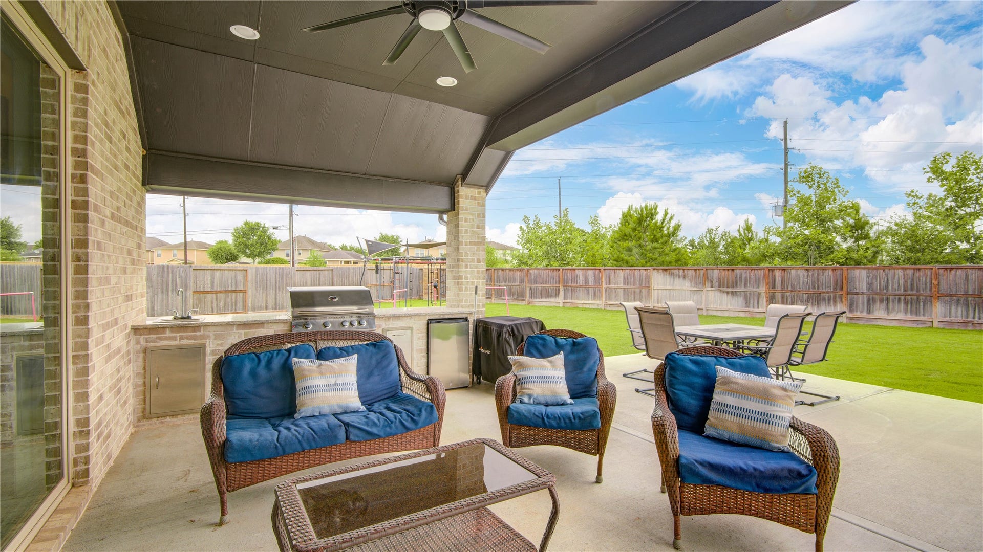 10834 Capella Creek Way, Richmond, TX 77406 2 Story Covered Patio with Outdoor Kitchen with extended patio space!
