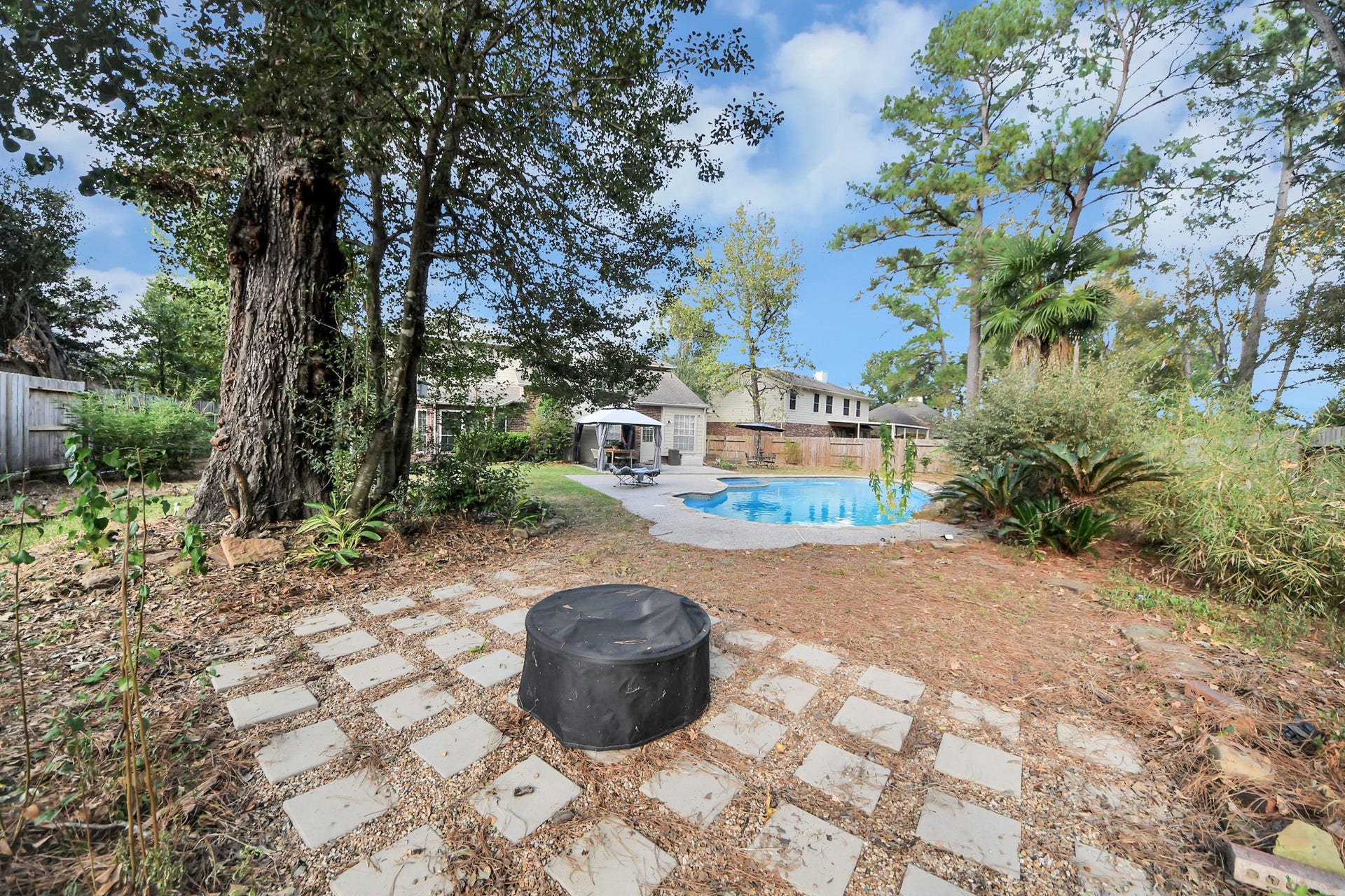 2610 Spring Bend Drive, Spring, TX 77386 Fire Pit Sitting Area on This Oversized Backyard.