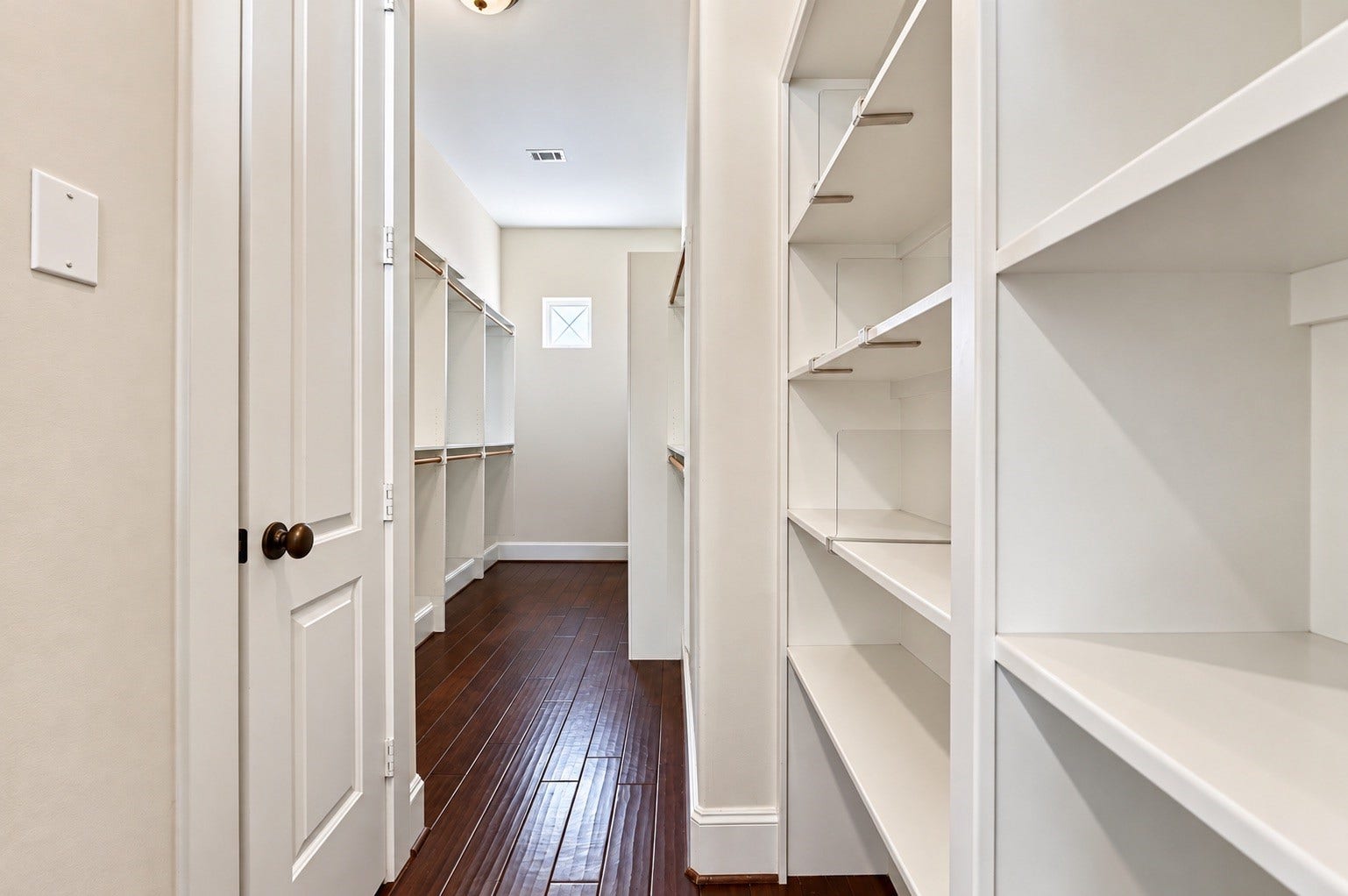 Image has removed photos to show the layout of the closet better.