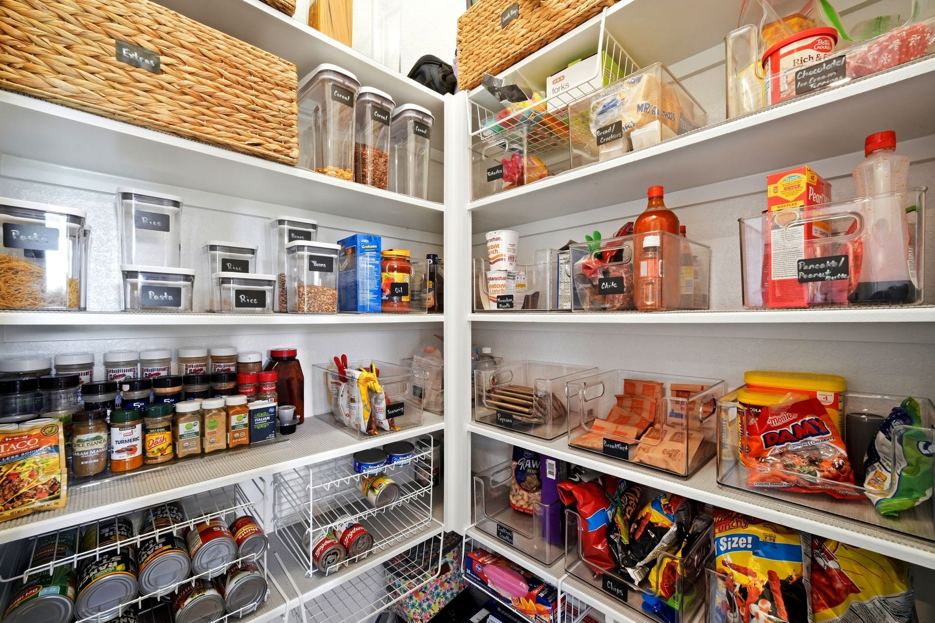 21639 Lexor Drive, Porter, TX 77365 Organized pantry with spacious shelving, easy access to essentials and ample storage for all your kitchen needs.