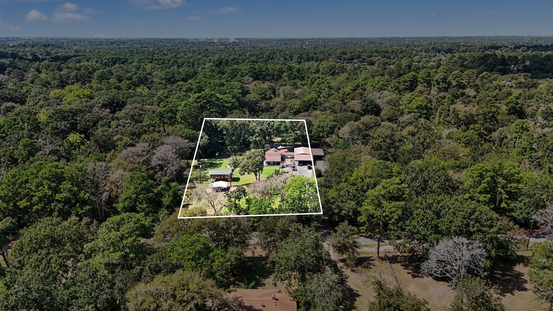 24609 Willow Lane, Hockley, TX 77447 Aerial view outlining the property and providing perspective on the size and layout of the grounds.