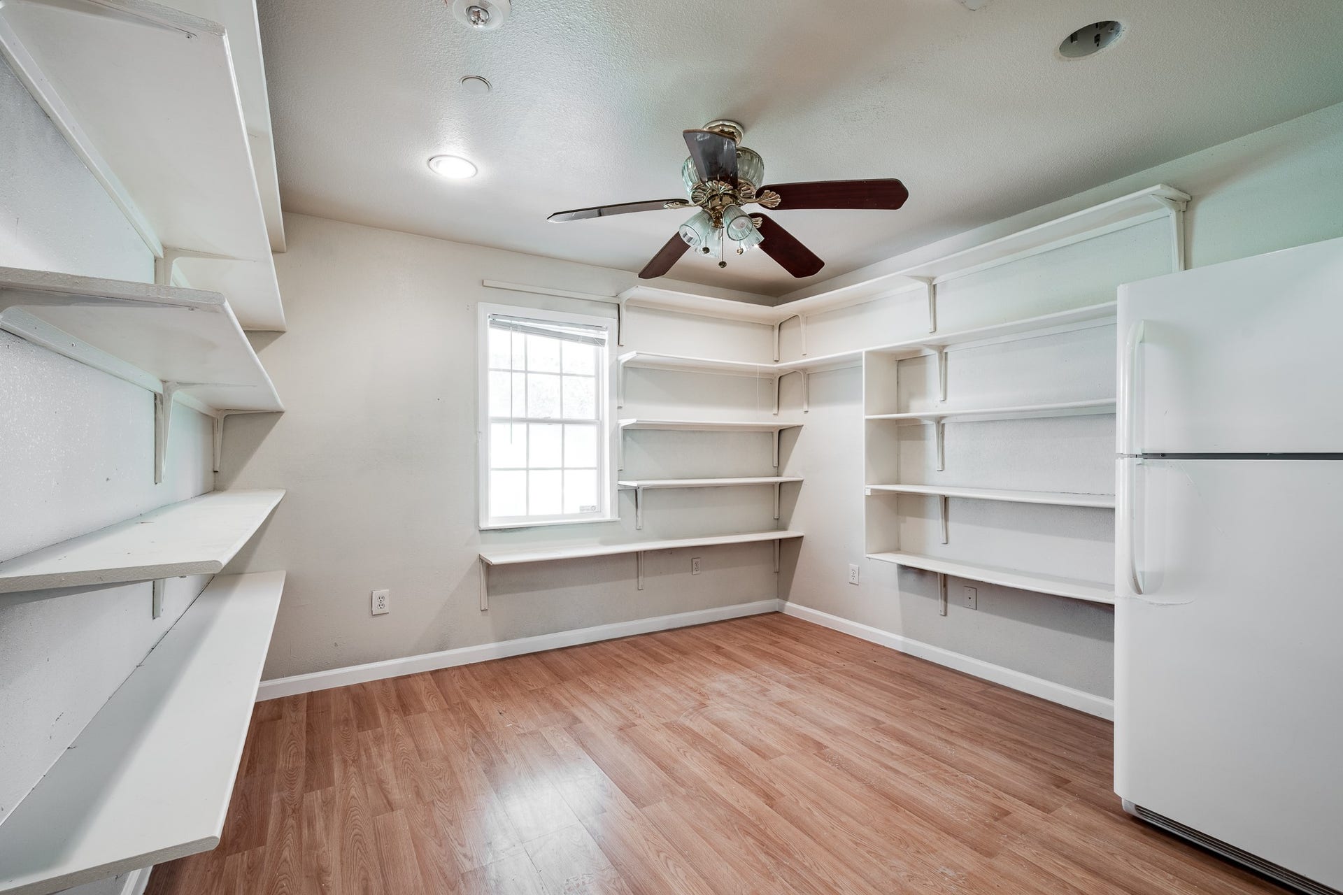 16111 Porter Lane, Porter, TX 77365 Large pantry with an additional refrigerator in building #3.