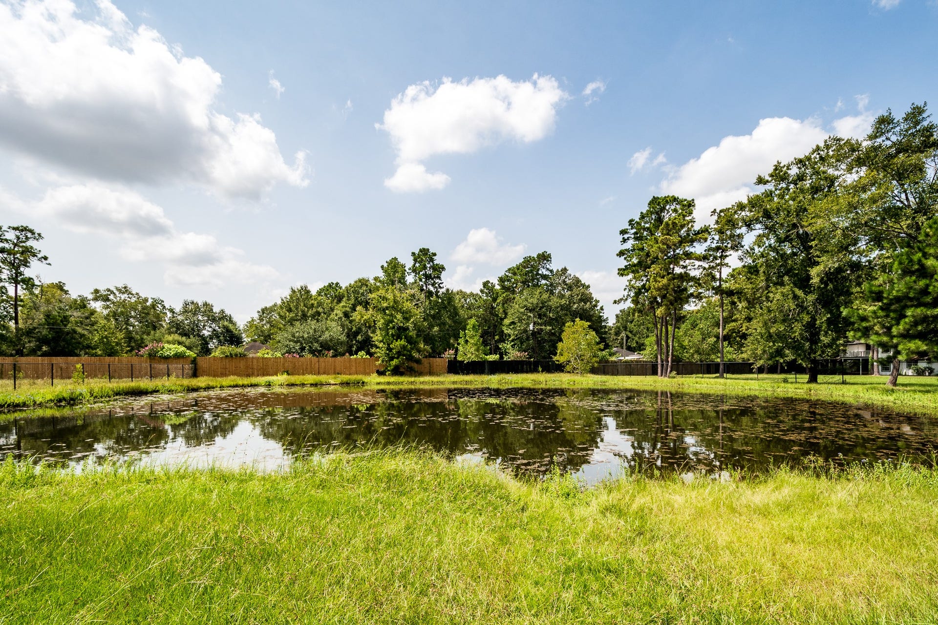 16111 Porter Lane, Porter, TX 77365 Pond located on south side of Porter Lane 8.5+/-Ac Tract w/ 6 buildings.