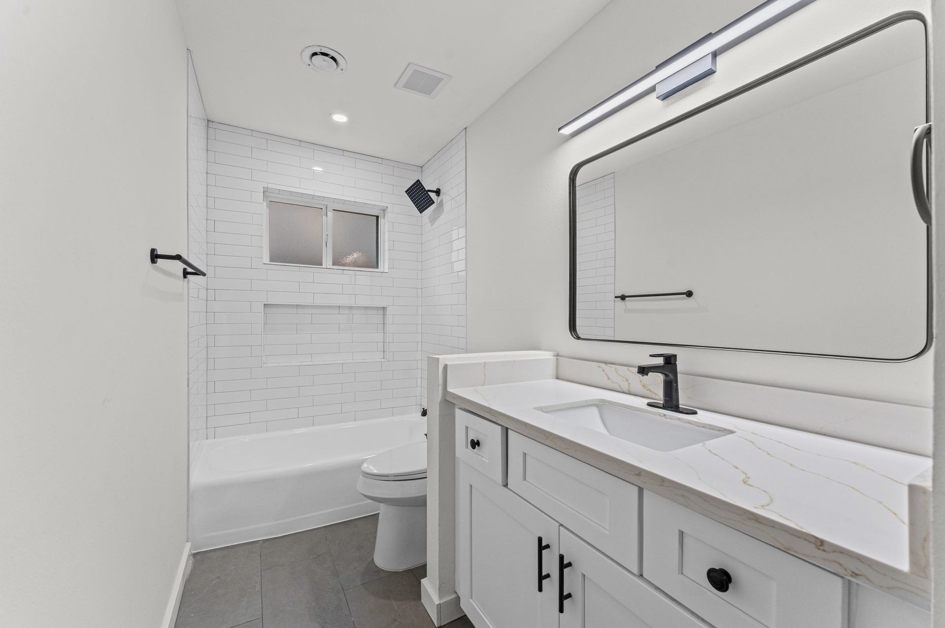 7519 Jason Street, Houston, TX 77074 Spacious secondary bathroom with large vanity area and storage space.