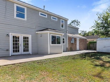 16606 Oxnard Lane, Friendswood, TX 77546 Enjoy the spacious backyard with no back neighbors, an extended concrete patio, and French doors providing easy access to the outdoors.
