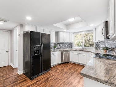 16606 Oxnard Lane, Friendswood, TX 77546 Kitchen featuring granite countertops
