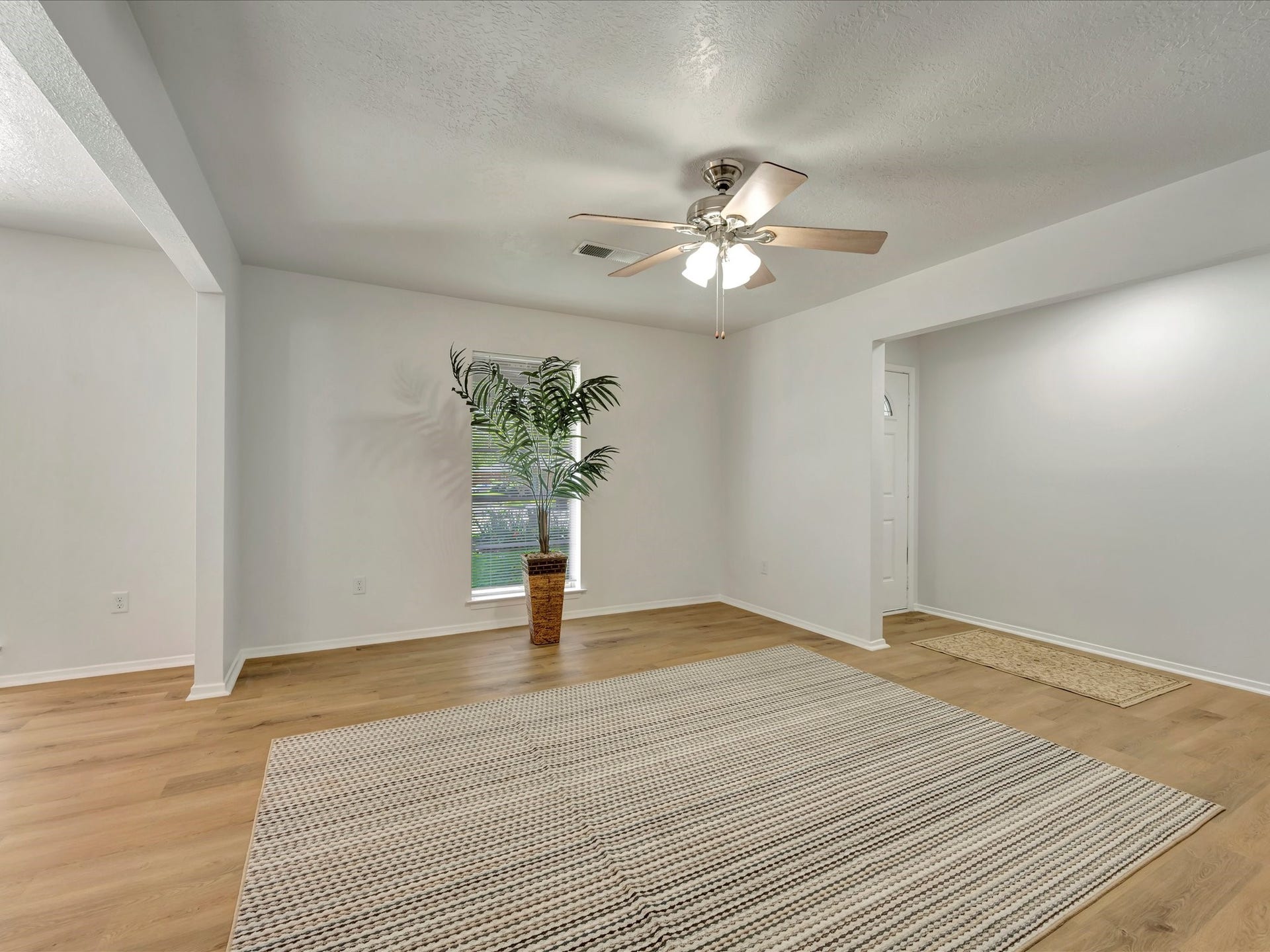 1003 Richvale Lane, Houston, TX 77062 Formal living with Fresh paint and Vinyl plank flooring