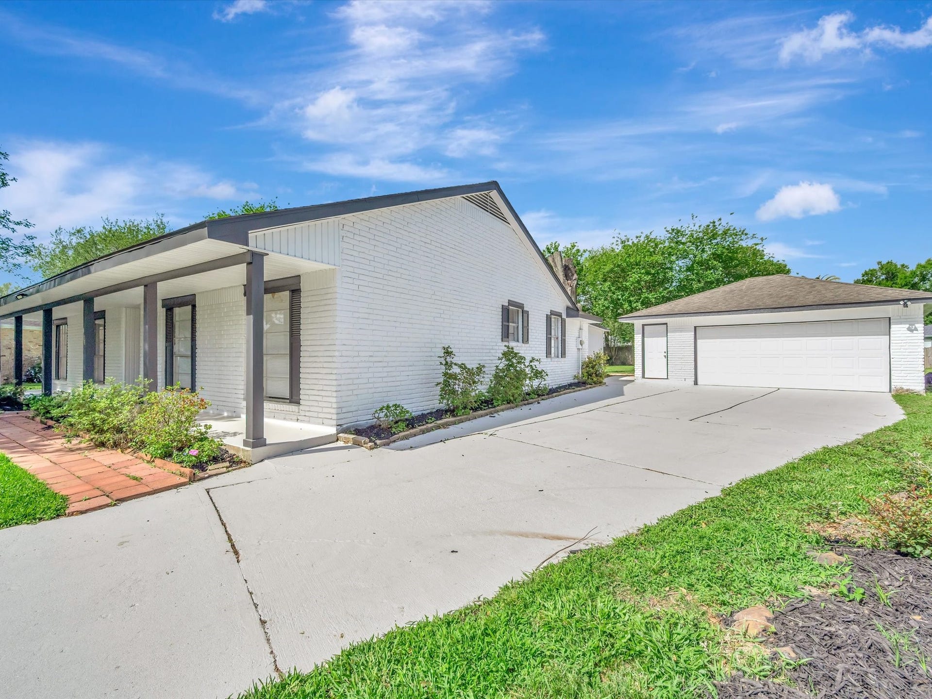 1003 Richvale Lane, Houston, TX 77062 The double wide driveway will meet all of your parking needs.