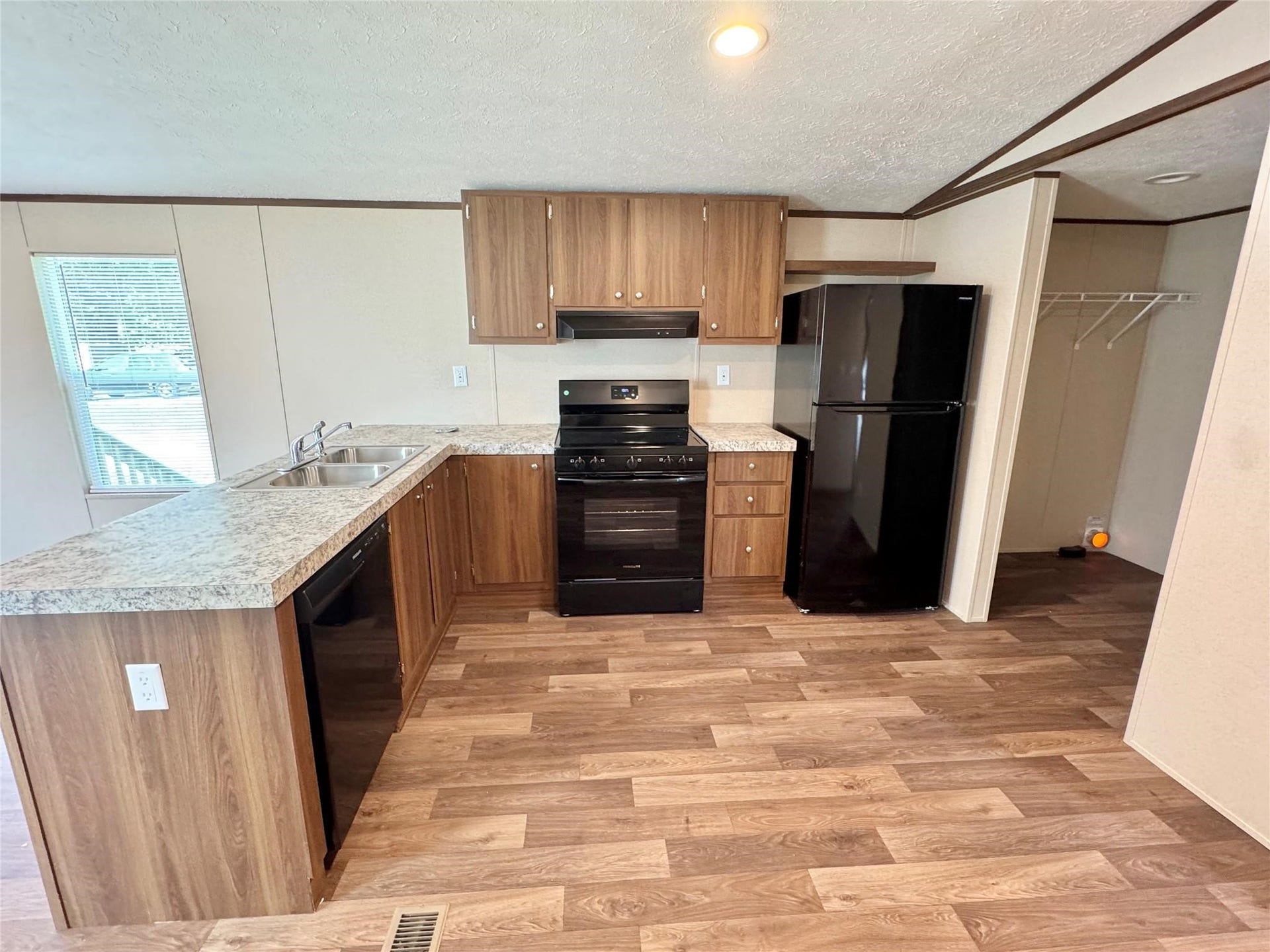Kitchen with appliances and refrigerator included