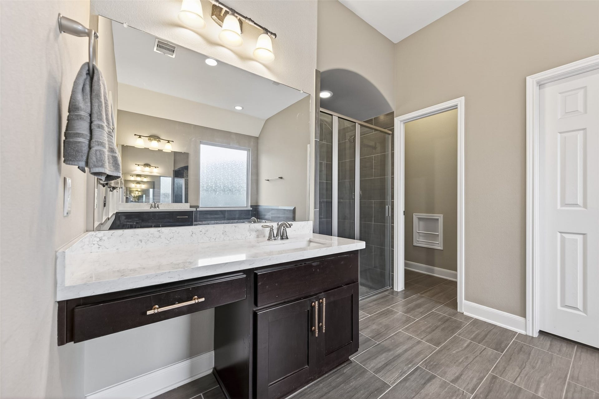19610 Pecos Bend Court, Cypress, TX 77433 Next to the vanity space is the walk-in shower.