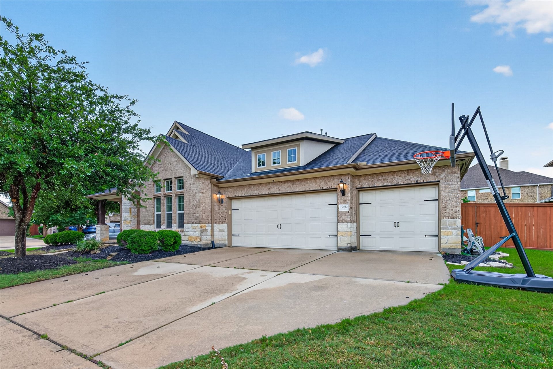19610 Pecos Bend Court, Cypress, TX 77433 Sitting on an oversized corner lot allows having a 3 car garage.