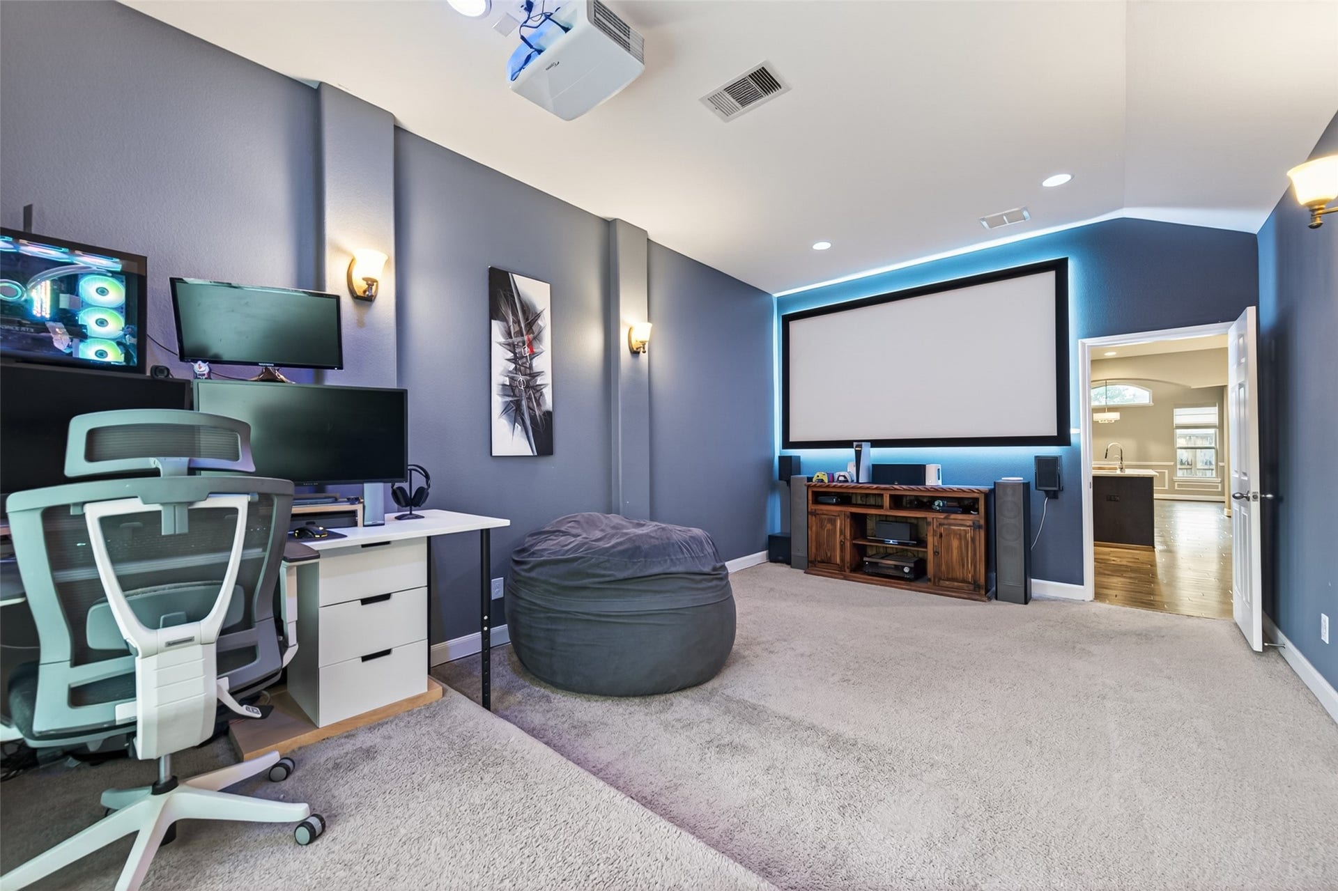 19610 Pecos Bend Court, Cypress, TX 77433 Due to the oversized lot, a theater room was added during the build.