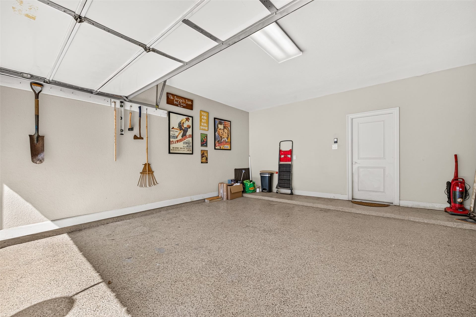 5930 Kiam Street, Houston, TX 77007 Double Garage: Epoxy Flooring, plenty of space for storage / tools. Door ahead leads to Kitchen.