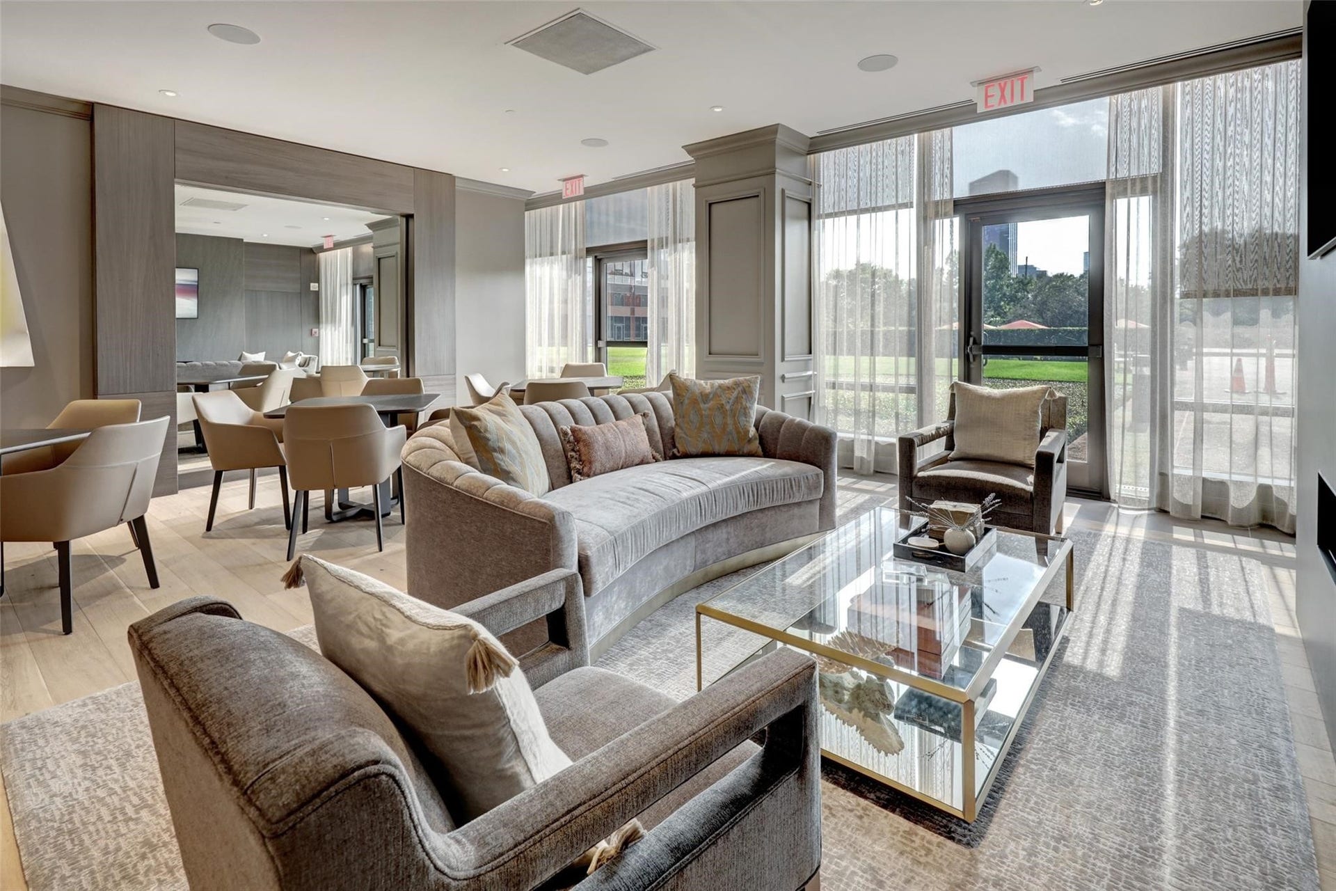 5100 San Felipe Street, #374E, Houston, TX 77056 Lounging areas and card tables opening to the party room.
