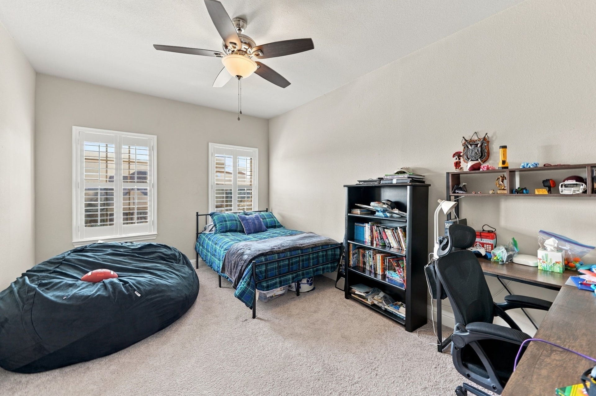 10511 Harvest Oak Court, Missouri City, TX 77459 A secondary bedroom upstairs.