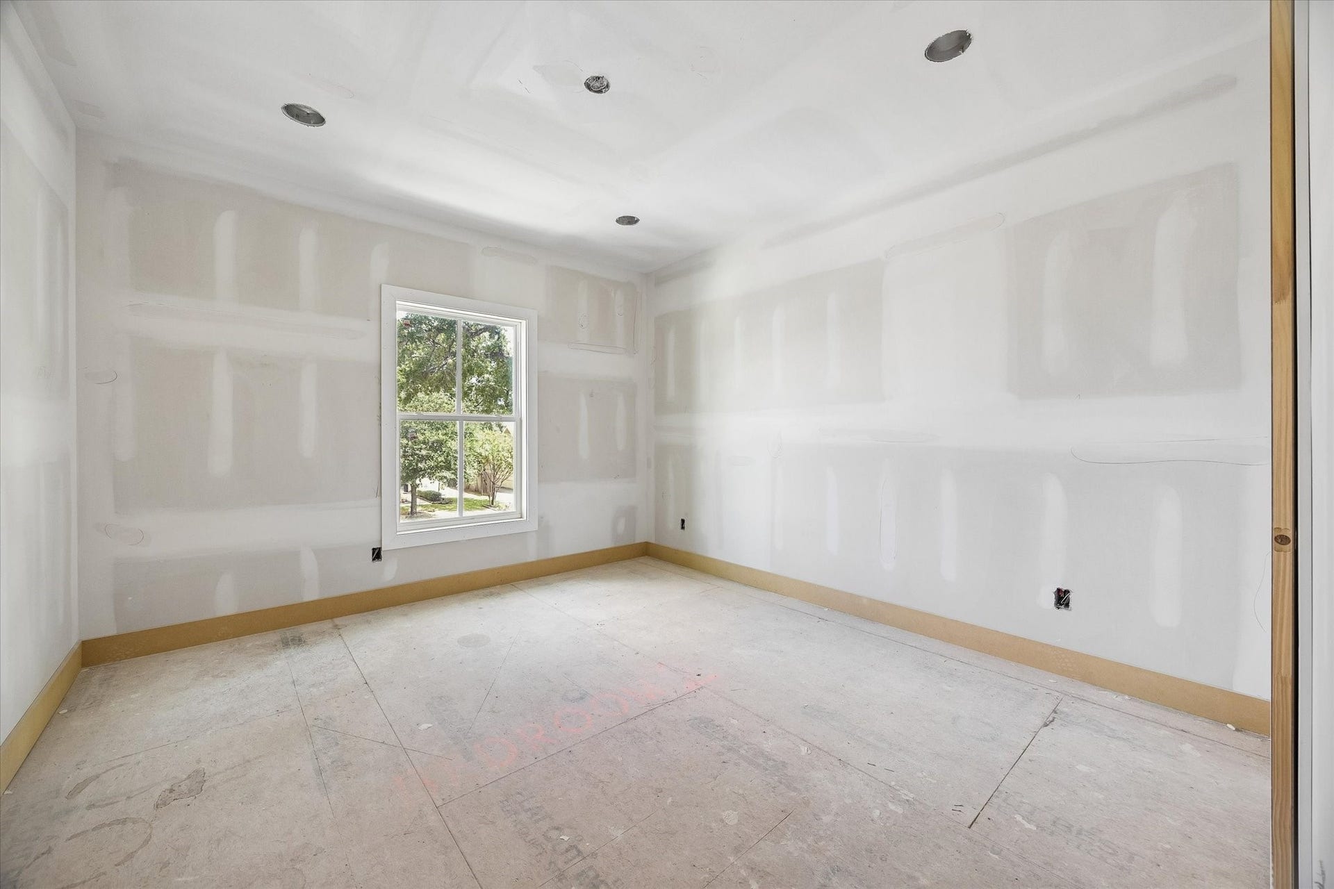 Natural light fills Bedroom 2 through a large window, while the well proportioned layout provides flexibility for a comfortable bedroom setup with room for additional storage or a study area. **Current Construction as of 9/11/26