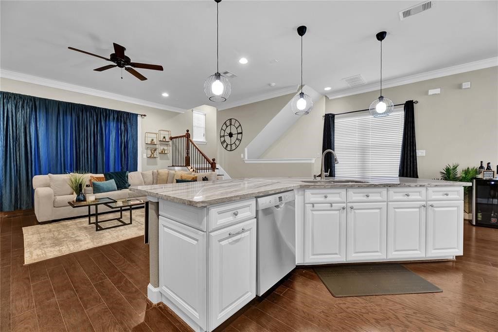 14502 San Pietro Drive, Houston, TX 77070 Kitchen island with elegant pendant lighting!