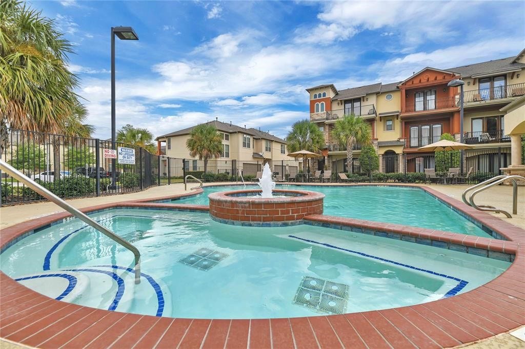 14502 San Pietro Drive, Houston, TX 77070 Community pool and spa surrounded by lush landscaping!