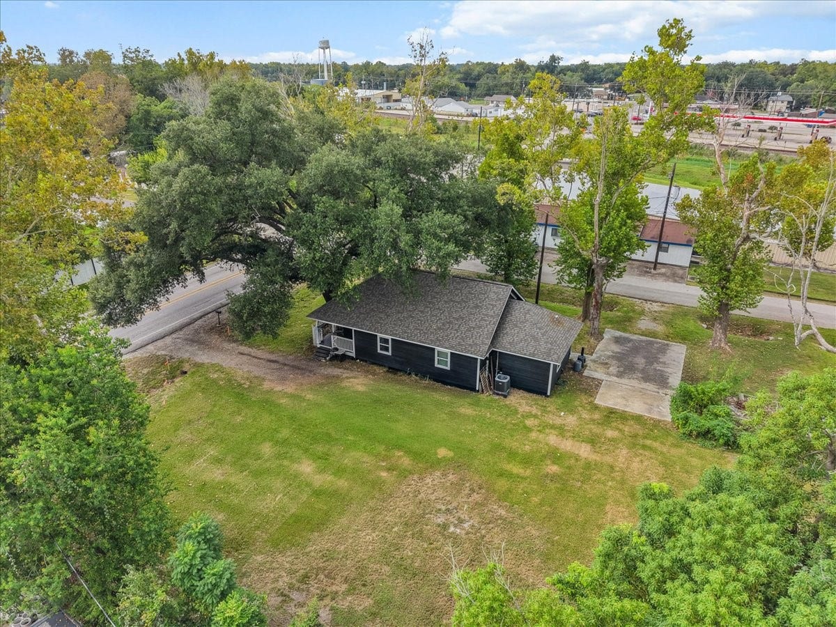 5201 Main Street, Santa Fe, TX 77510 A generous yard, mature trees, and two porches give this property plenty of outdoor charm. Whether you're sipping your morning coffee on the porch or envisioning a future pool or shop, this property offers room to make it your own.