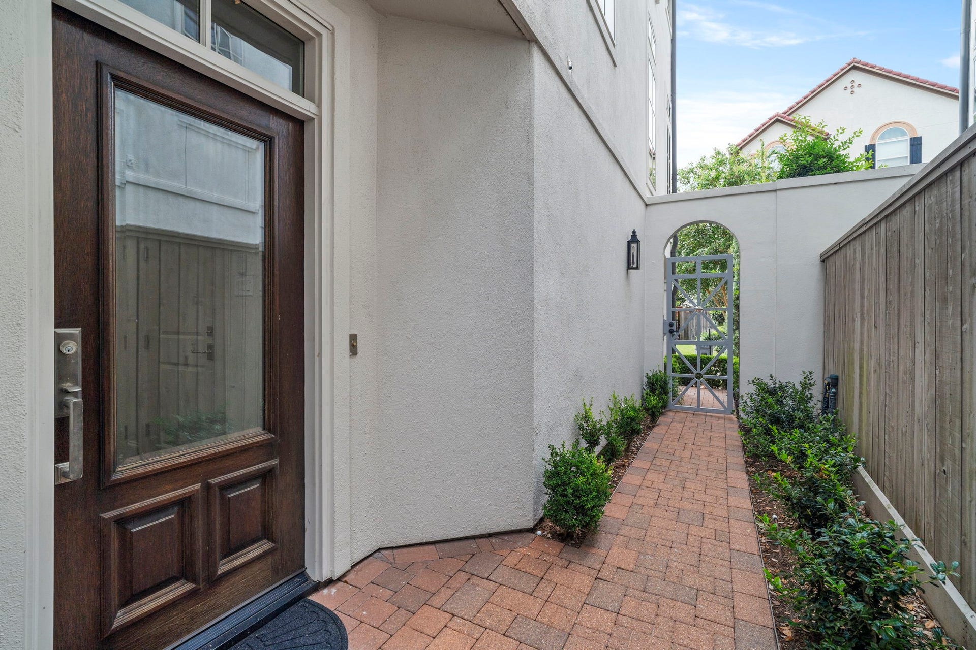 15931 Morgan Street, Sugar Land, TX 77478 A handsome solid-wood and glass door provides a private side entrance to the home.