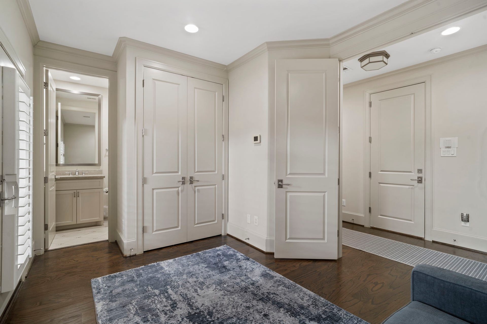 15931 Morgan Street, Sugar Land, TX 77478 The first-floor bedroom also features a double-door closet, recessed lighting, beautiful wood flooring, and plantation shutters.