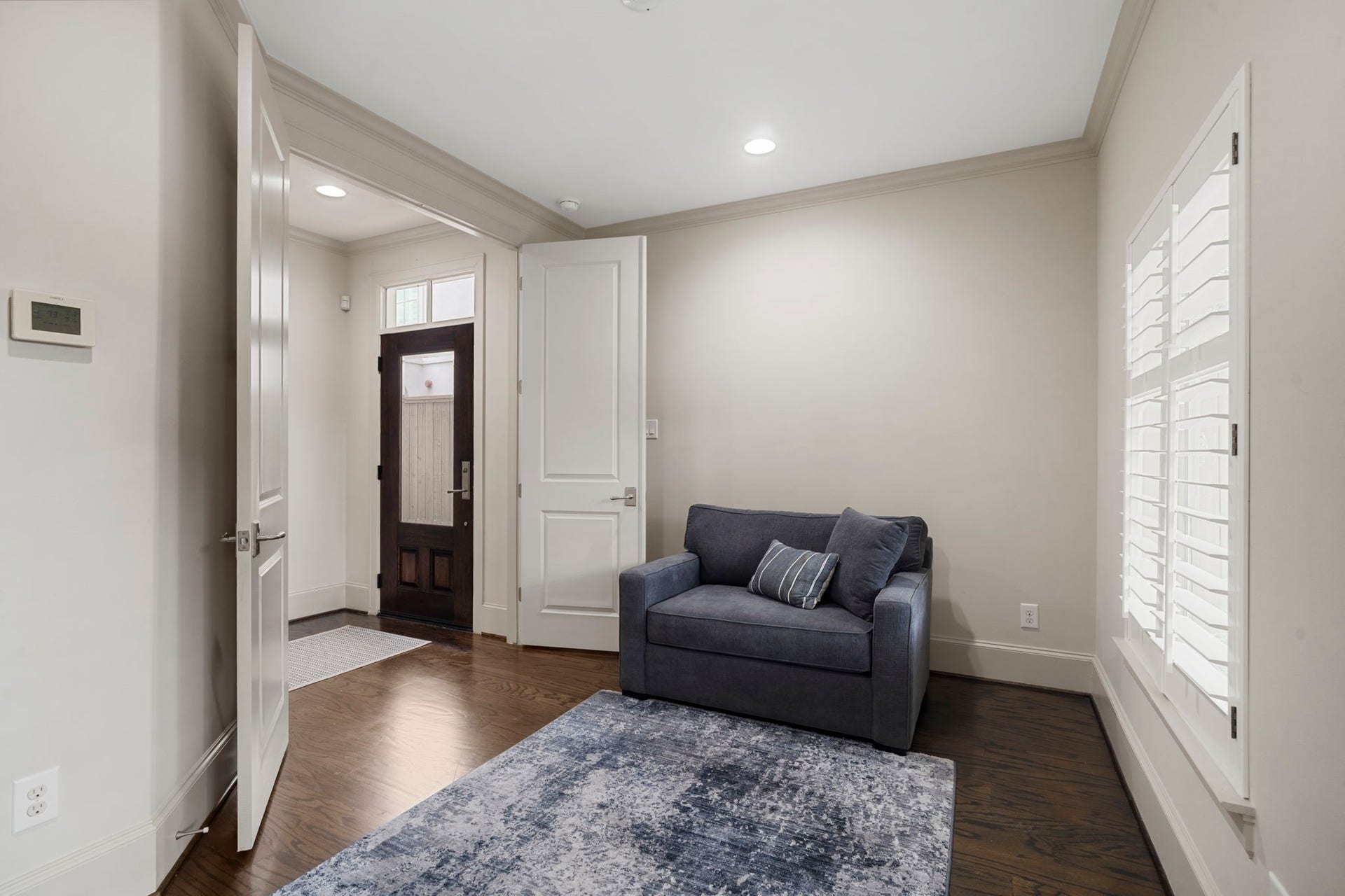 15931 Morgan Street, Sugar Land, TX 77478 Another view of the first floor bedroom, a versatile space that can adapt to fit your lifestyle perfect as a home office, workout space, guest suite, or in-law suite.