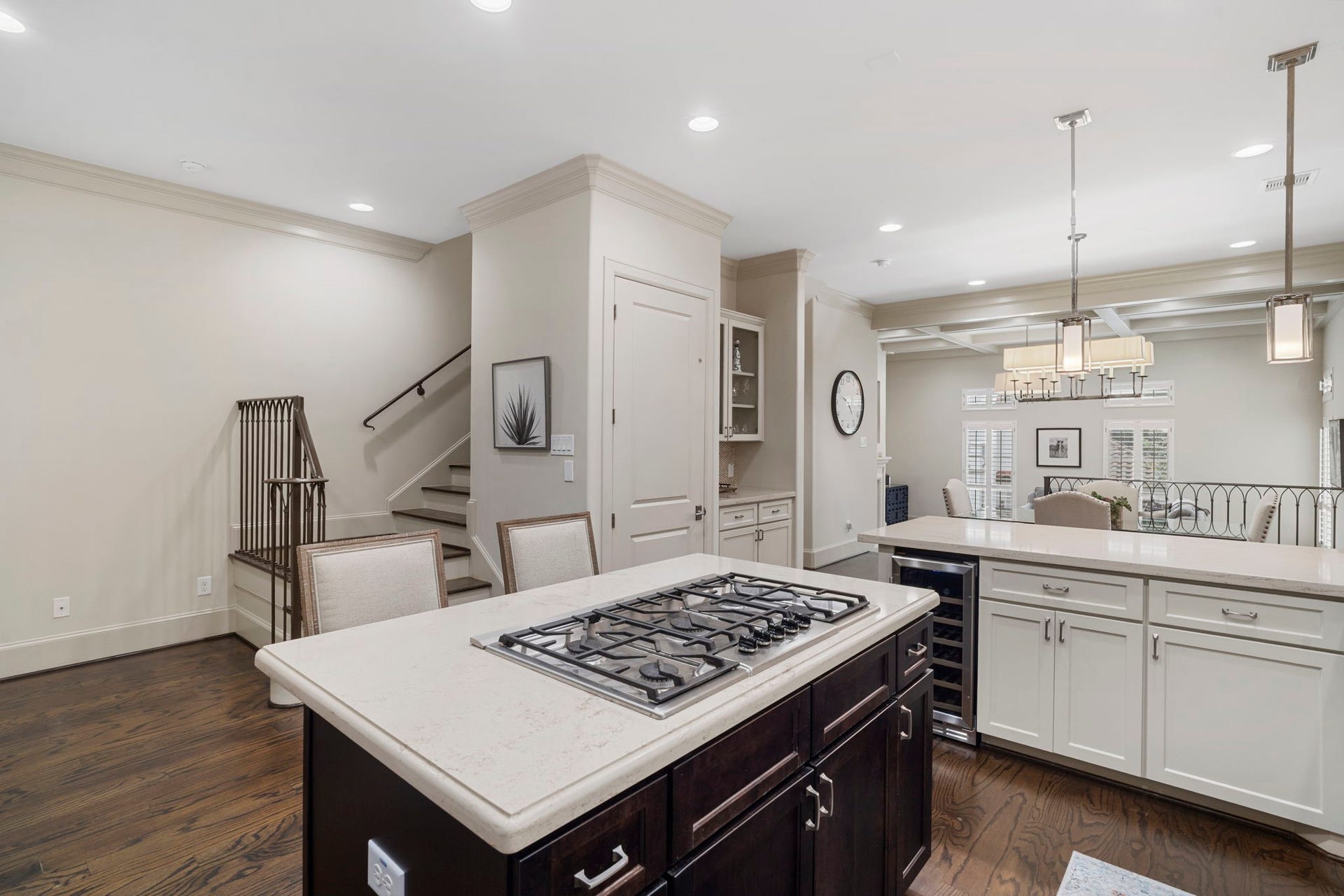 15931 Morgan Street, Sugar Land, TX 77478 Soft-close cabinets and drawers, under-cabinet lighting, and a pantry complete the well-appointed kitchen.