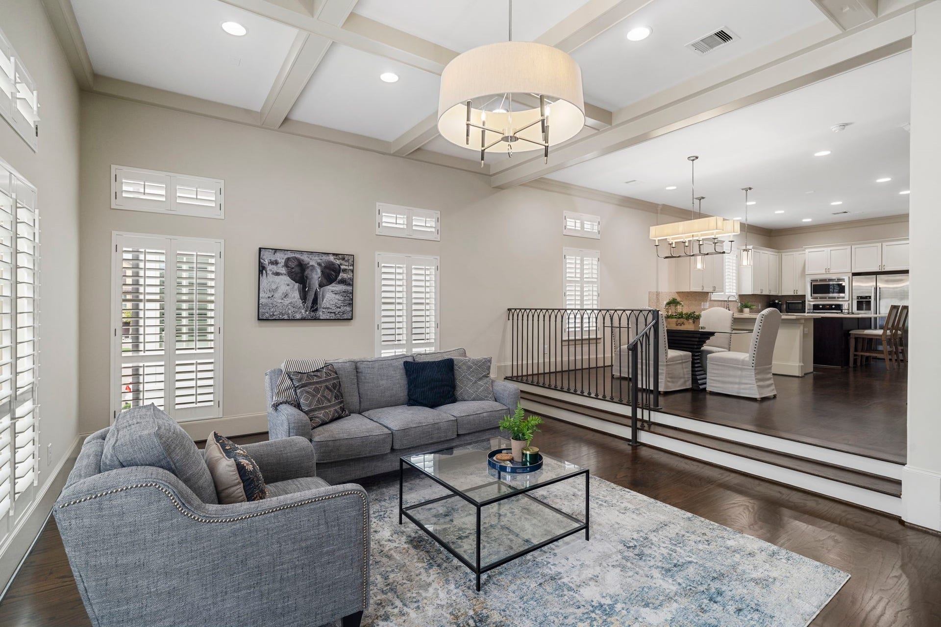 15931 Morgan Street, Sugar Land, TX 77478 A decorative railing between the dining and living areas subtly defines each space while maintaining an open flow.