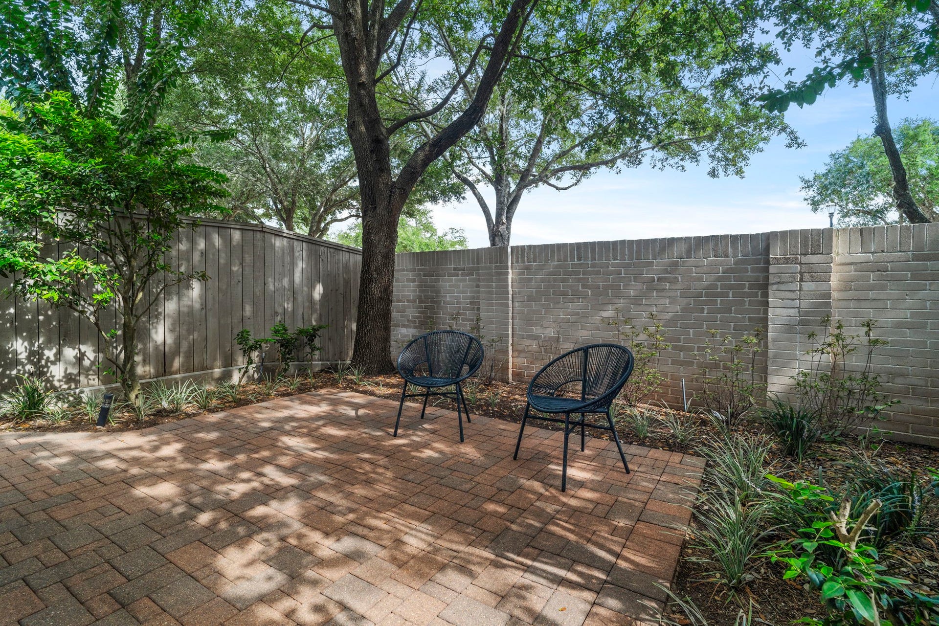 15931 Morgan Street, Sugar Land, TX 77478 Unwind in the secluded, walled backyard, a peaceful extension of the homes living space.