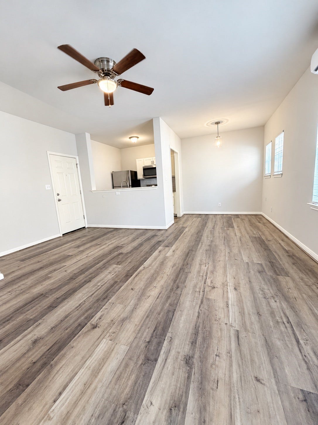 4313 Harrisburg Boulevard, #4, Houston, TX 77003 Another view of kitchen, breakfast & living room.