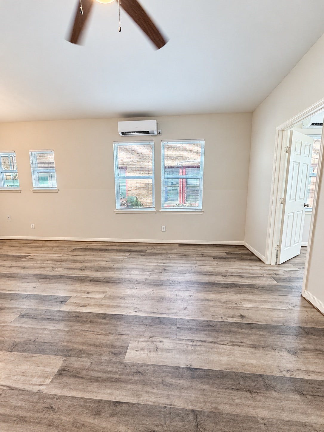 4313 Harrisburg Boulevard, #4, Houston, TX 77003 Living room with multiple windows.