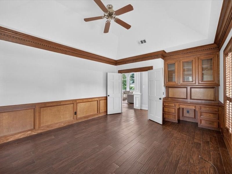 32719 Weybridge Street, Fulshear, TX 77441 The office space also has built-in shelving and a desk.