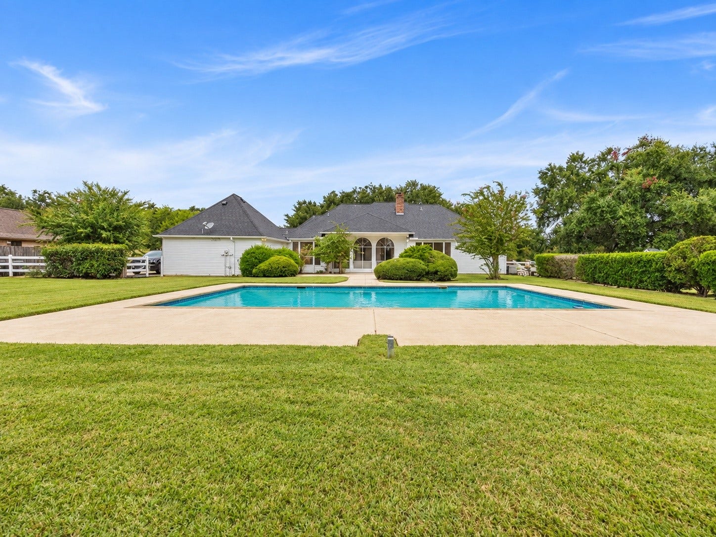 32719 Weybridge Street, Fulshear, TX 77441 The back of the home is as stately as the front.