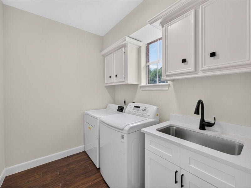 32719 Weybridge Street, Fulshear, TX 77441 The utility room has cabinets/shelving and a sink. The washer and dryer are included.