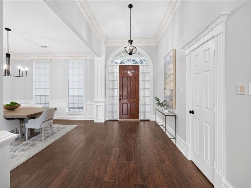 32719 Weybridge Street, Fulshear, TX 77441 A beautiful entrance that will make you say "wow"!
