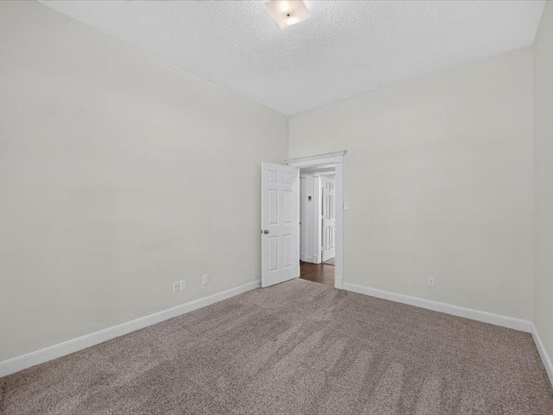 32719 Weybridge Street, Fulshear, TX 77441 This bedroom also has fresh paint and new carpet.