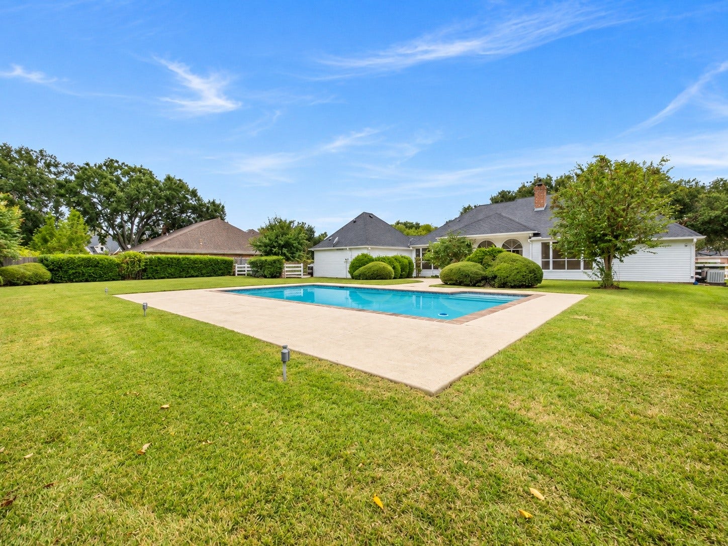 32719 Weybridge Street, Fulshear, TX 77441 An oversized pool is perfect for entertaining.