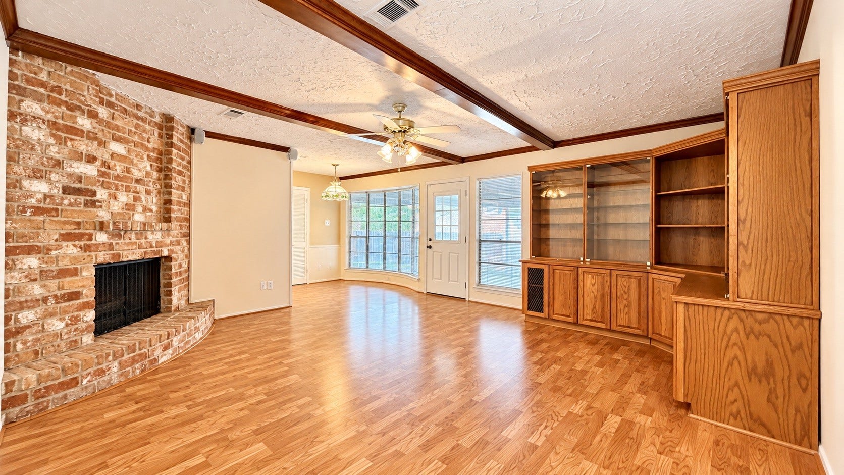 12314 Dorrance Lane, Meadows Place, TX 77477 Living room with wood flooring.