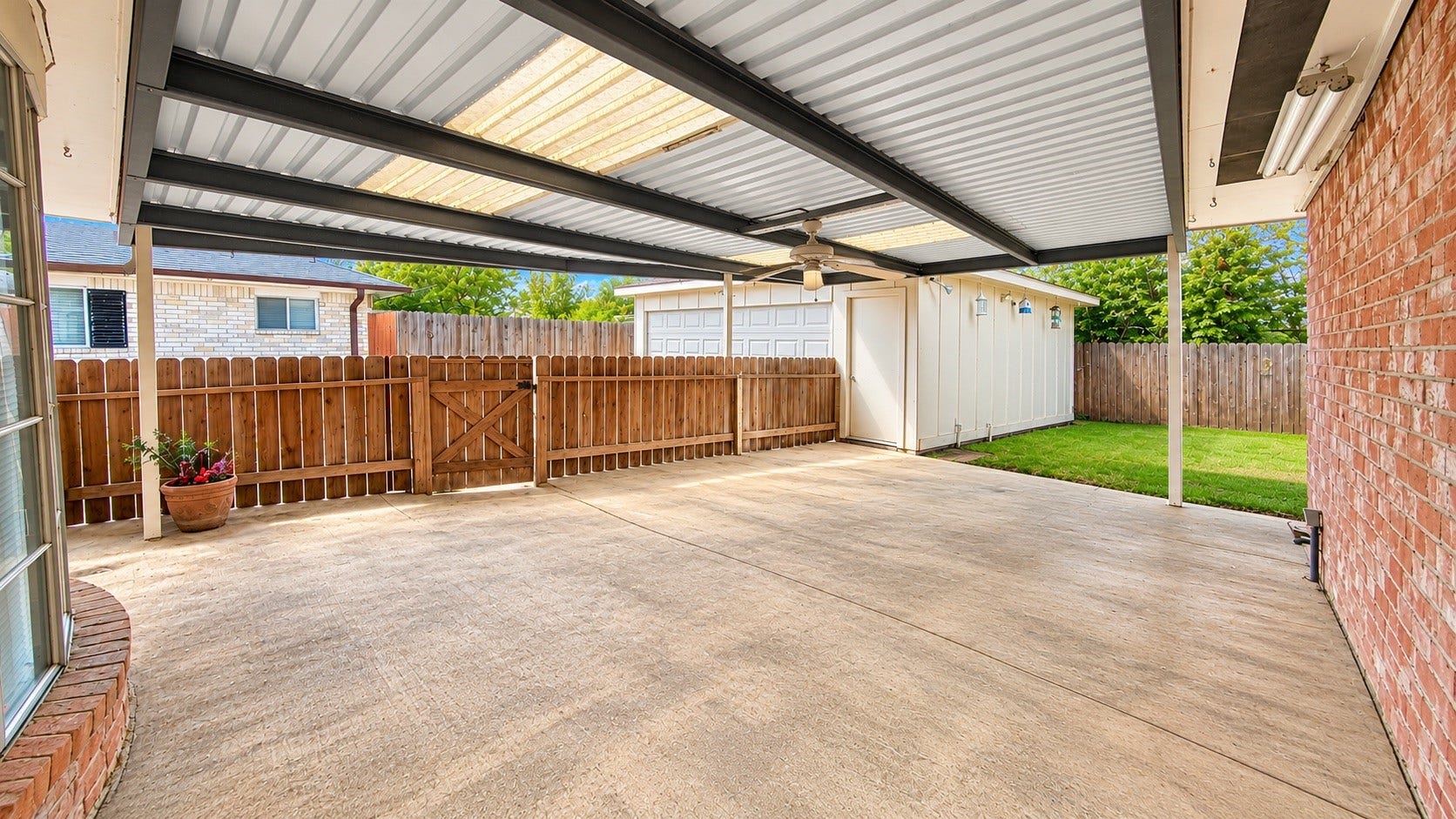 12314 Dorrance Lane, Meadows Place, TX 77477 Covered patio area.