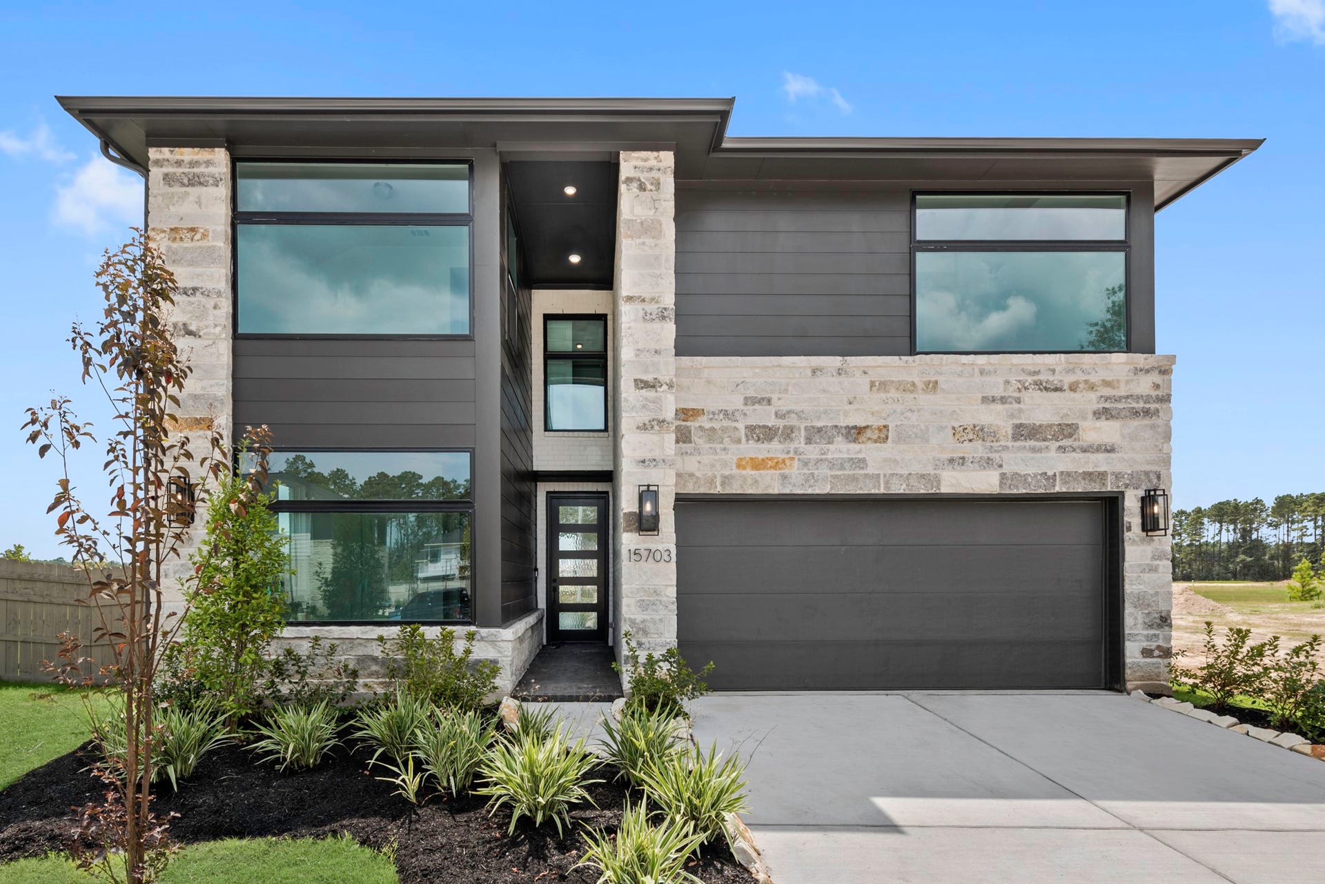 Move-In Ready! Westin Homes | Park Avenue II  New Construction. Grass is digitally enhanced.