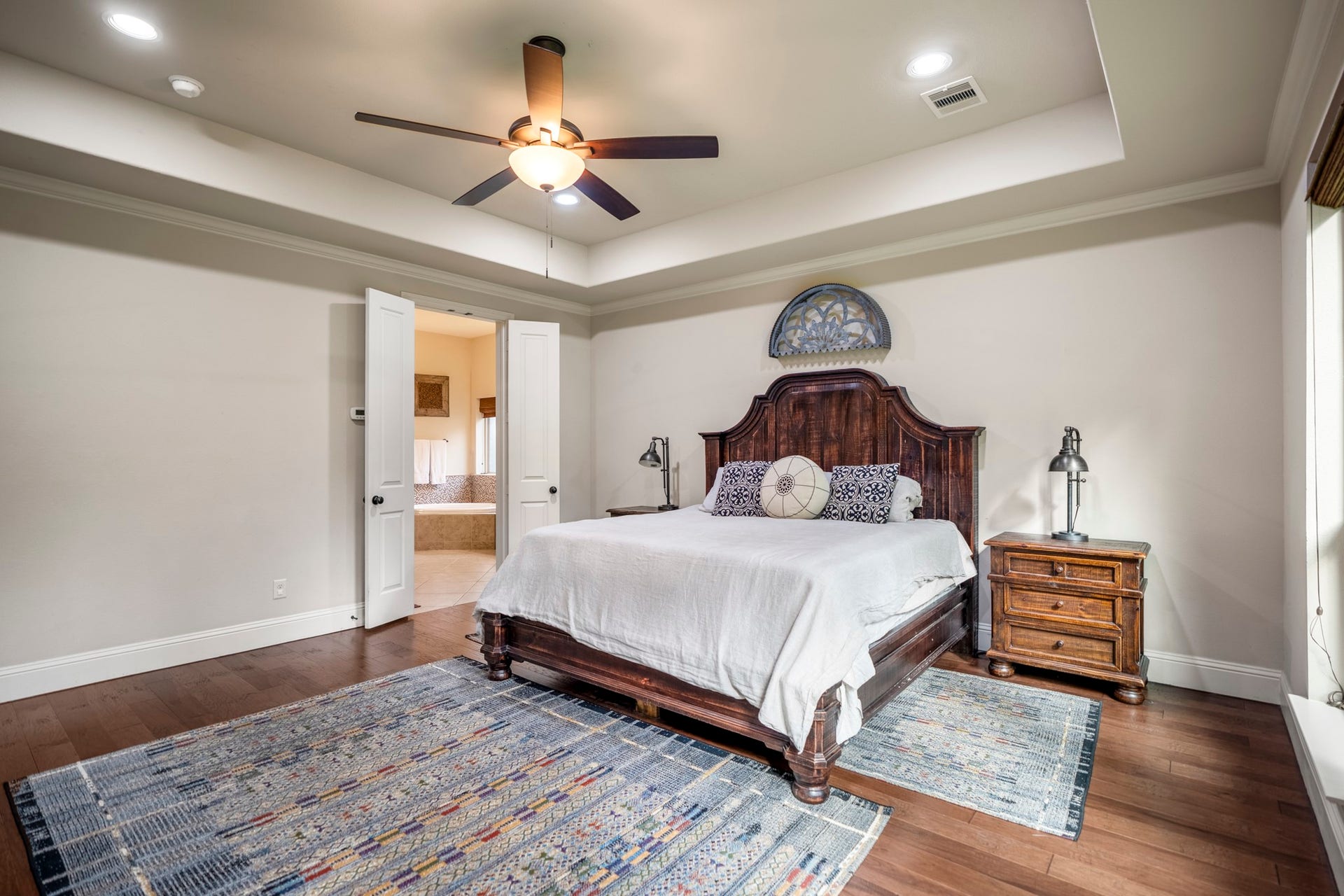 The primary bedroom and two secondary bedrooms are all located on the first floor.