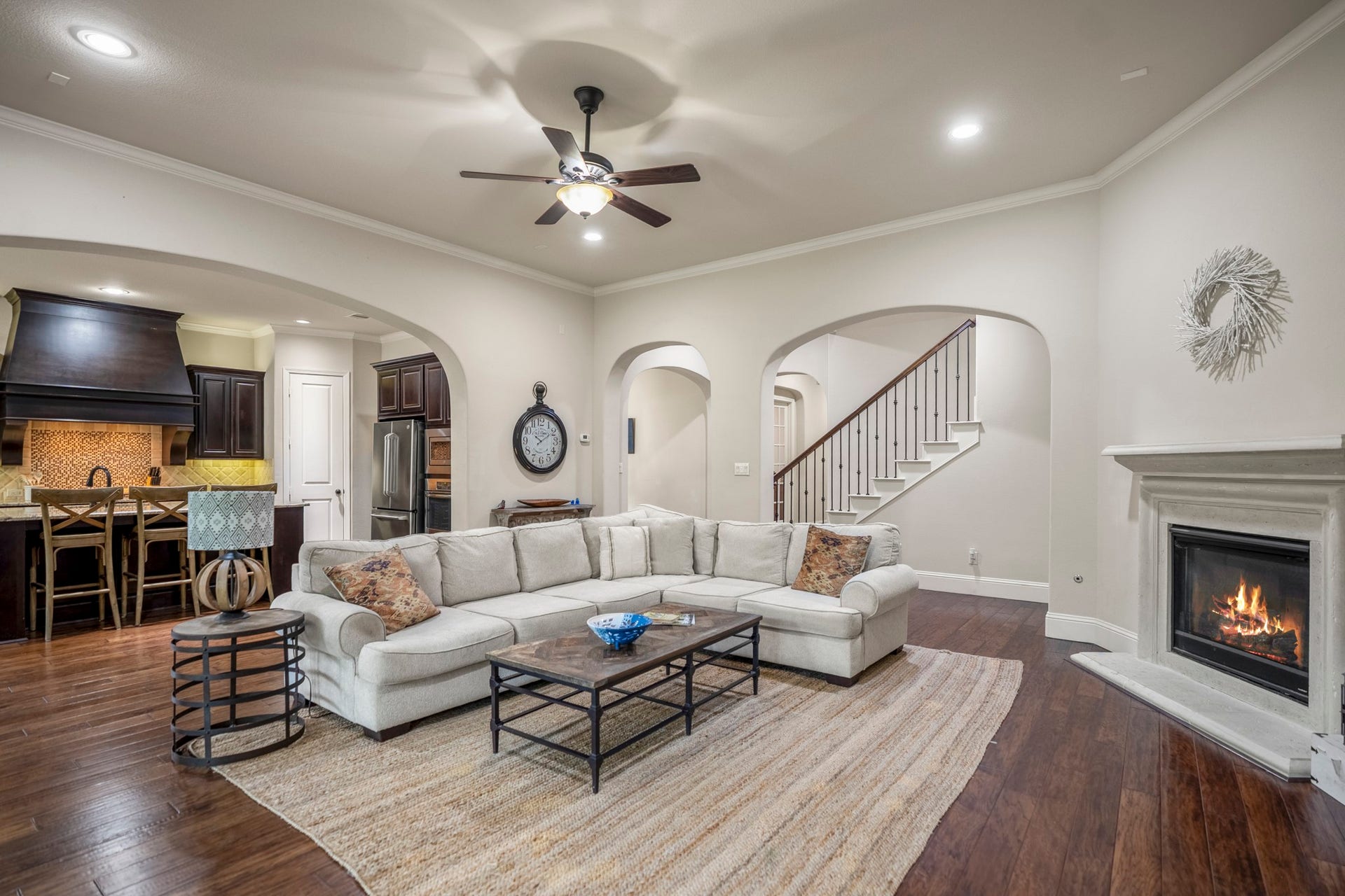 Seamless flow between the living area and kitchen creates a welcoming central hub.